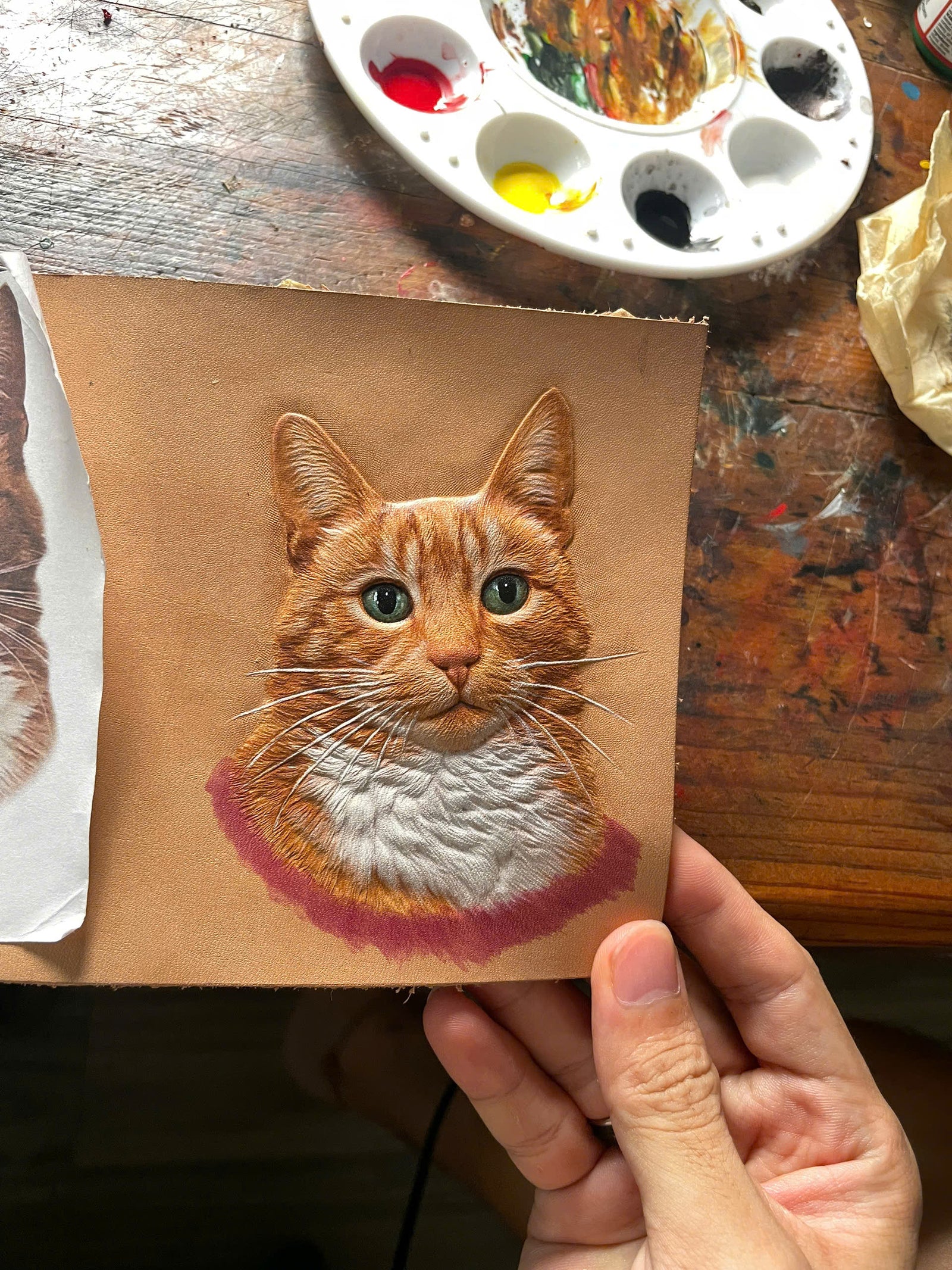 Color applied to carved leather relief