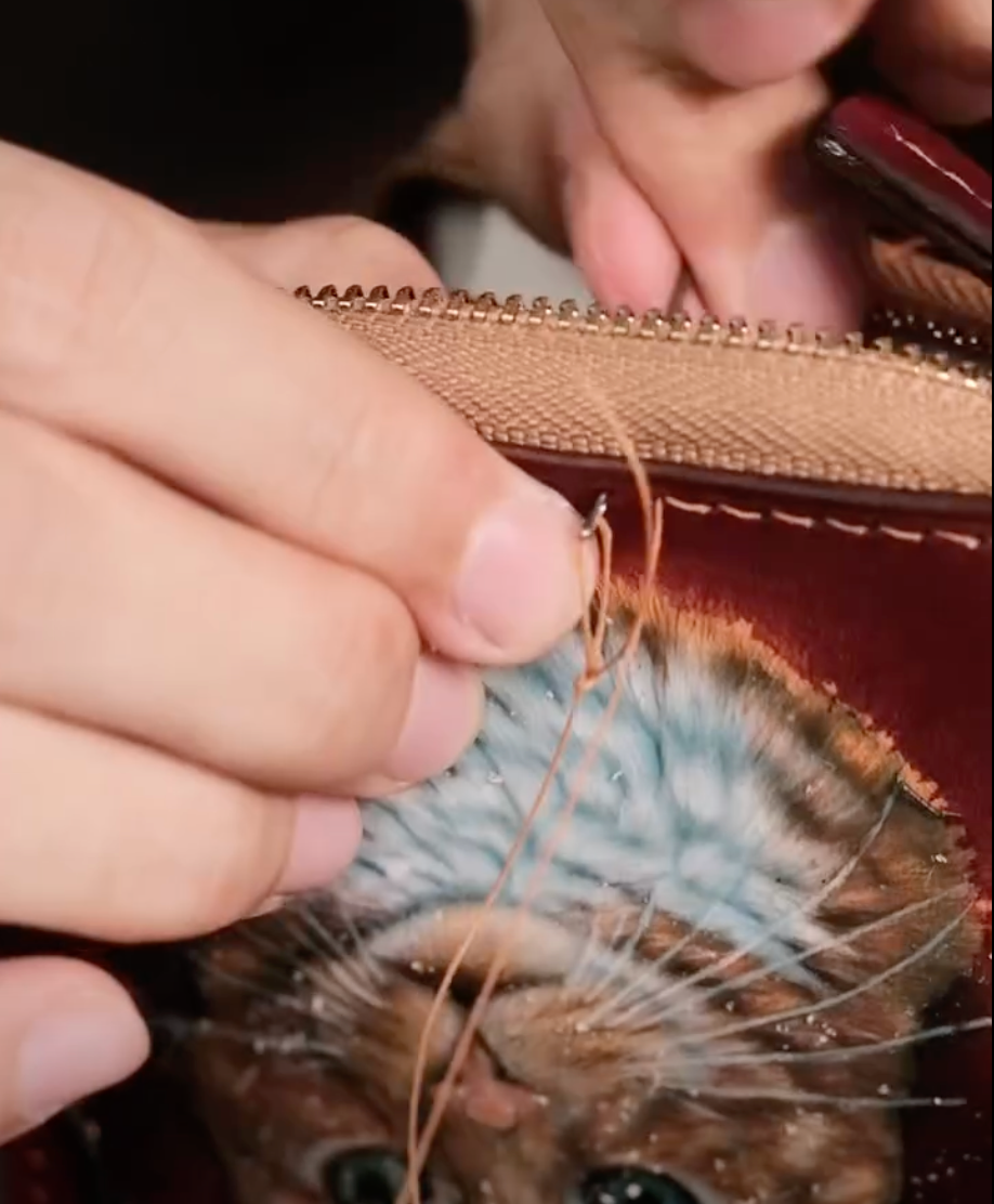 The custom piece being stitched